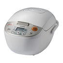 A white Zojirushi rice cooker, featuring multiple cooking functions and an automatic keep-warm cycle for convenient meal preparation.