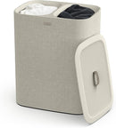 Joseph Joseph ecru 90-liter dual laundry hamper with removable fabric bags and lid, displayed on a white background.
