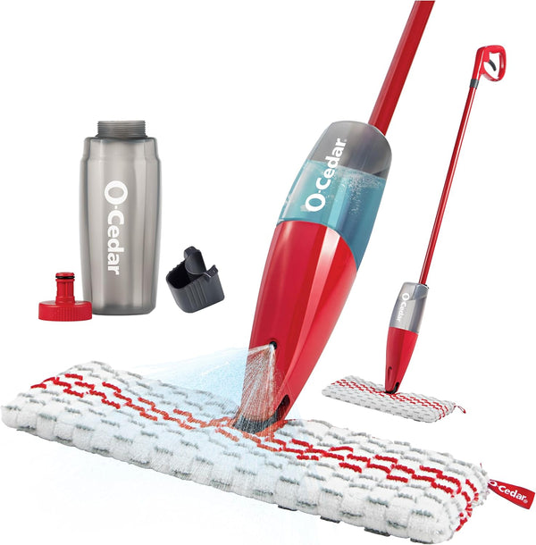 A red O-Cedar ProMist MAX spray mop system featuring a dual-sided mop head (white/red stripes), an integrated refillable water bottle, and a separate silver-toned bottle for mixing cleaning solution.