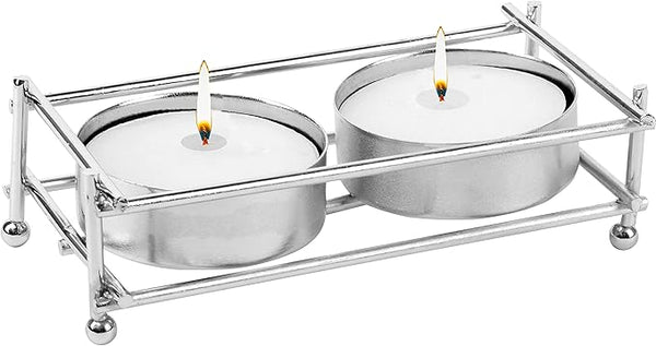 Pair of nickel-plated Ner Mitzvah tealight holders with tealight candles on a white background.