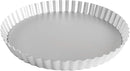 Fat Daddio's 9.5-inch round fluted tart pan made of anodized aluminum, ideal for baking tarts, pies, and quiches, on a white background.