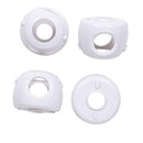 Four white plastic door knob covers designed for child safety, arranged on a white background.