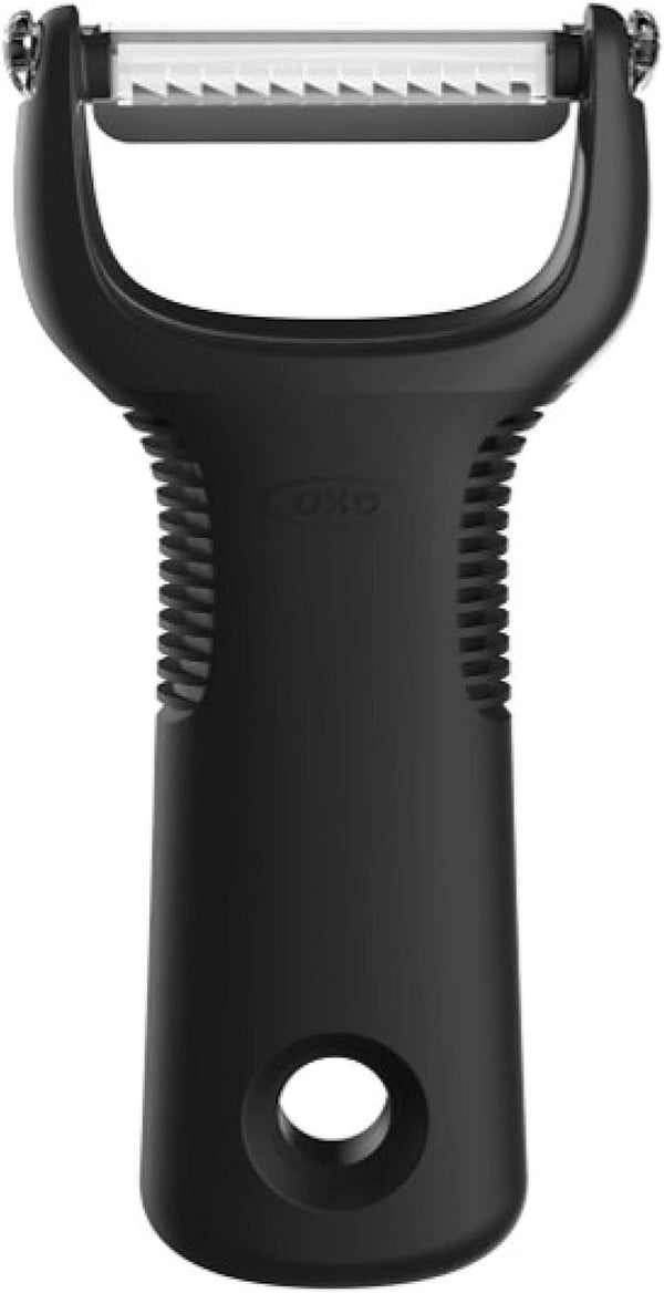 OXO Good Grips julienne peeler with stainless steel blade and soft non-slip handle on a white background.