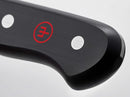 WÜSTHOF Gourmet black ergonomic handle on a white background.