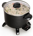 A black electric multi-cooker with a nonstick interior, short legs, a glass lid, and a detachable black temperature control probe.