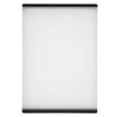 OXO Good Grips plastic carving and cutting board with drip-catcher groove and non-slip feet on a white background.