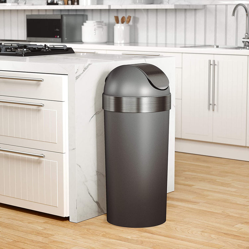 Angled view of grey and silver swing-top trash can