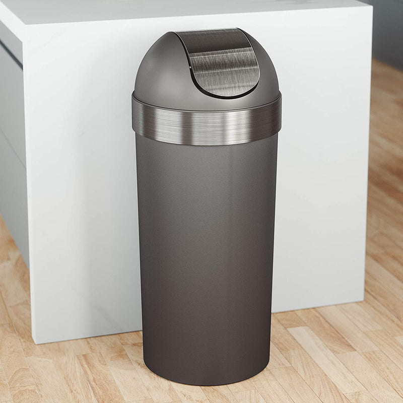 Angled view of grey and silver swing-top trash can