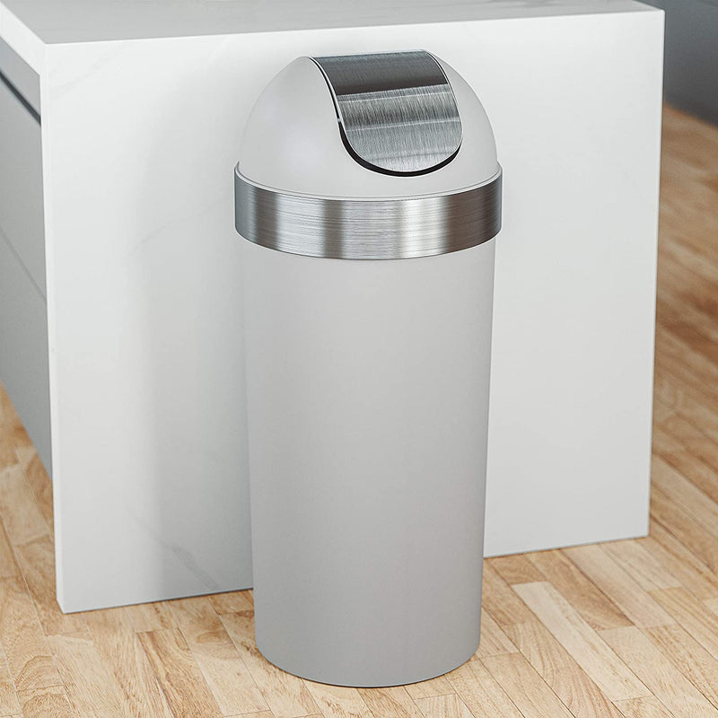Large kitchen trash can shown beside a modern cabinet