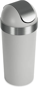Angled view of grey trash can showing domed lid design