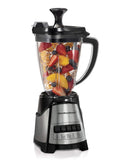 A Hamilton Beach blender with a brushed stainless steel and black base, a clear Tritan jar filled with fruits and ice, and a removable gray mesh strainer/chopper insert.