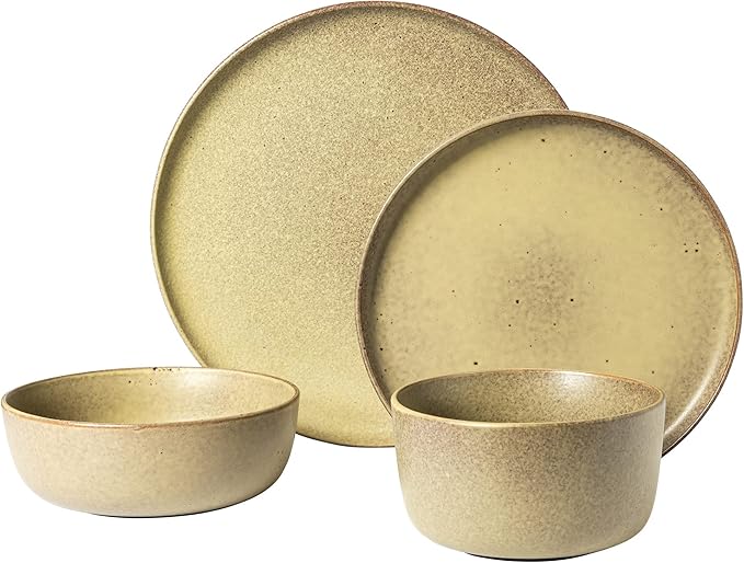 Cream-colored 16-piece stoneware dinnerware set with dinner plates, salad plates, soup bowls, and smaller bowls on a white background.