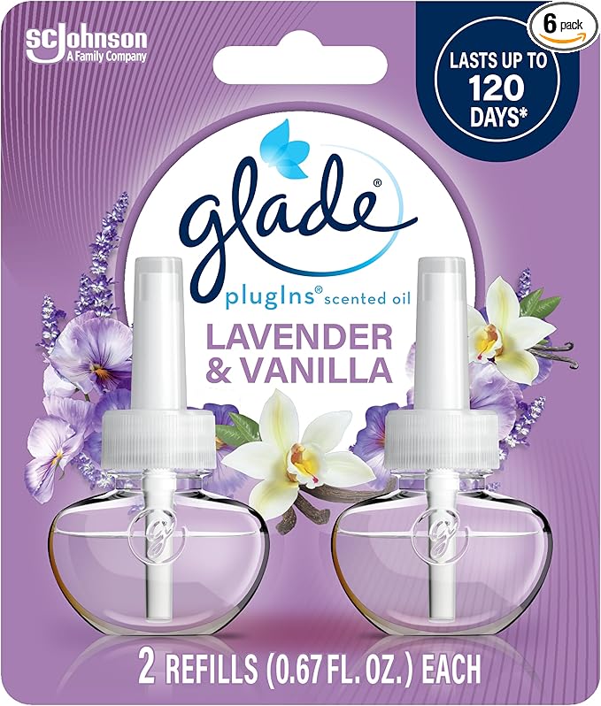 Two Glade PlugIns scented oil refills in Lavender & Vanilla scent, featuring transparent bottles with purple-tinted oil and lavender-themed labeling, shown on a white background.