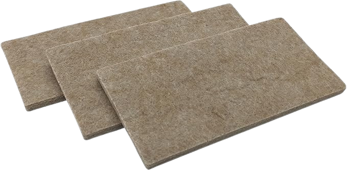 beige 2-inch by 4-inch heavy-duty felt furniture pads on a white background.