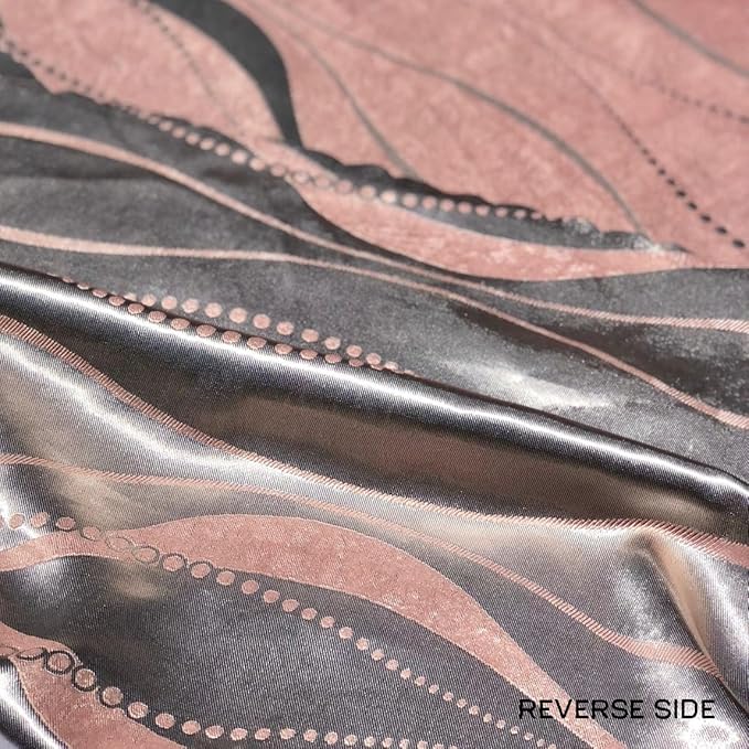 Pink Pearl tablecloth elegantly spread over a large dining table, highlighting its scalloped edges and jacquard texture.