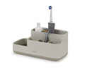 Joseph Joseph EasyStore bathroom caddy in ecru with divided compartments.
