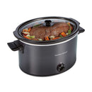 Hamilton Beach 10-quart black slow cooker filled with roast and vegetables, shown with a clear glass lid and side handles