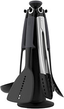 A set of six gray and black Joseph Joseph kitchen utensils on a black rotating carousel stand. The utensils include a spoon, ladle, spatula, and tongs.