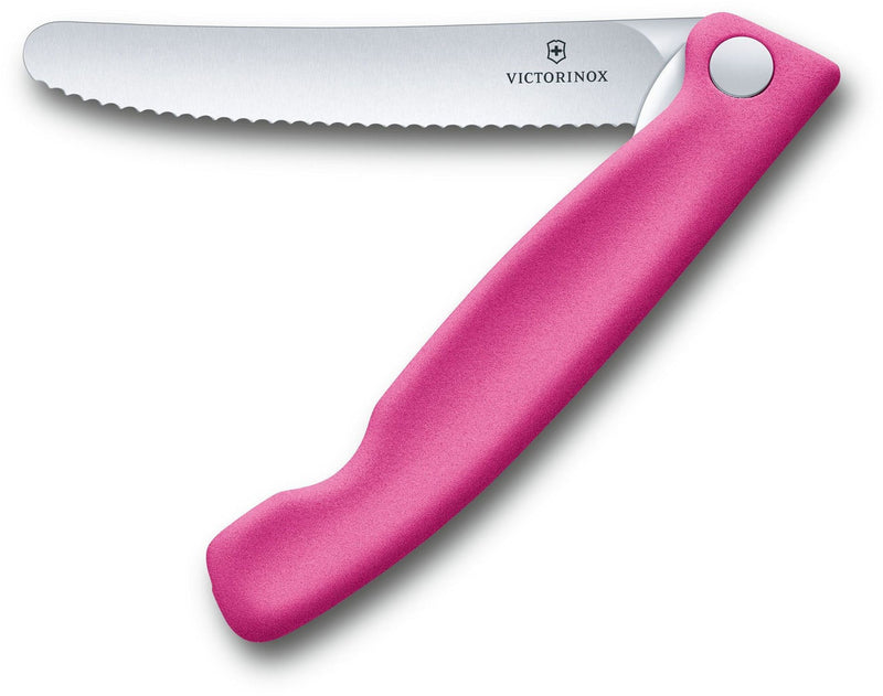 Victorinox foldable serrated knife with a pink ergonomic handle and stainless steel blade.