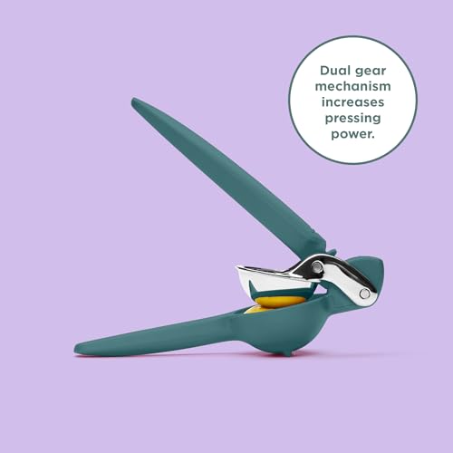 A side view of a teal-colored Chef'n FreshForce Lemon Squeezer, showcasing its ergonomic design with two long handles, and visible chrome-plated metal components at the hinge and pressing mechanism.