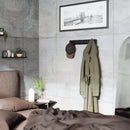 Black Umbra Flip 5 Hook wall-mounted coat rack with retractable hooks 