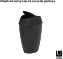 Umbra trash bin with text showing swing-top lid feature