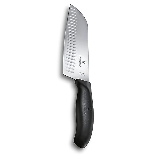 Victorinox 7-inch Granton edge Santoku knife with a stainless steel blade and black ergonomic Fibrox handle.