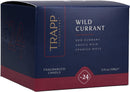 The Trapp No. 24 Wild Currant Small Poured Candle burning, creating a warm and inviting ambiance.