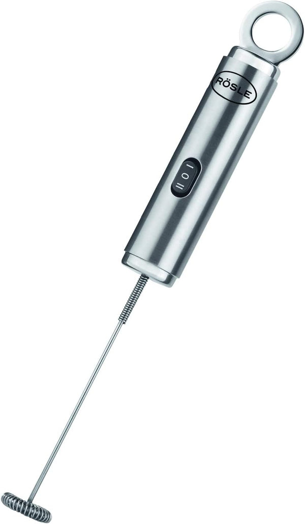 A sleek stainless steel electric milk frother with a long whisk attachment and an ergonomic handle featuring a built-in power button.