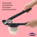 Black potato and vegetable ricer with a sturdy design, showing a metal mashing basket and long handles.