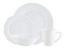 Four-piece white dinnerware set including dinner plate, salad plate, bowl, and mug