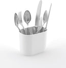 A gray Joseph Joseph Expandable Dish Drying Rack with a removable white cutlery holder and a plated steel wire rack for dishes. The rack is shown in its compact size.