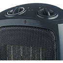 Brentwood Portable Ceramic Space Heater and Fan, as a rounded, compact design in a black color. The front features a black honeycomb grill protecting the ceramic heating element. On the top, there are two rotary dials for adjusting the thermostat and selecting the heat or fan mode. A small indicator light is also visible on the front.