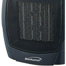 Brentwood Portable Ceramic Space Heater and Fan, as a rounded, compact design in a black color. The front features a black honeycomb grill protecting the ceramic heating element. On the top, there are two rotary dials for adjusting the thermostat and selecting the heat or fan mode. A small indicator light is also visible on the front.