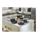 Overhead view of Cuisinart cookware set displayed in kitchen on island countertop