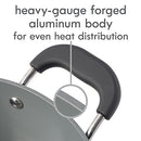 Close-up of the Dutch oven’s heavy-gauge aluminum body and handle attachment