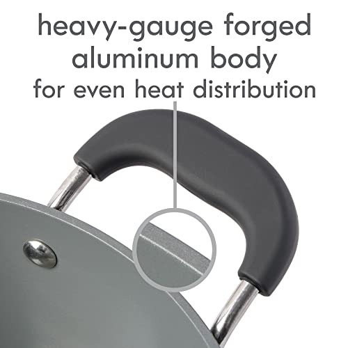 Close-up of the Dutch oven’s heavy-gauge aluminum body and handle attachment