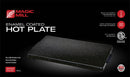 Compact 23" x 13" Magic Mill enamel coated hot plate with non-slip rubber feet, rounded edges, and a 1-year warranty.
