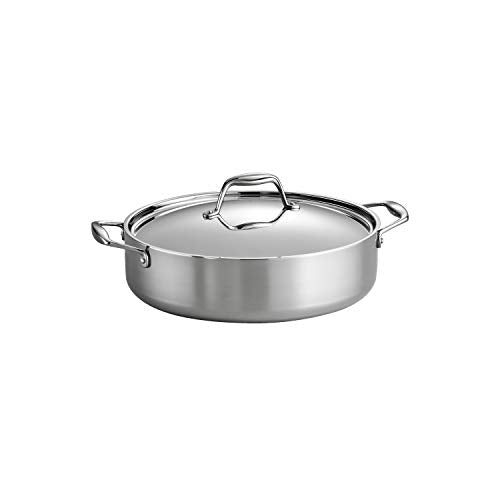 Stainless steel round cooking pot with a transparent glass lid and side handles, ideal for various cooking methods.