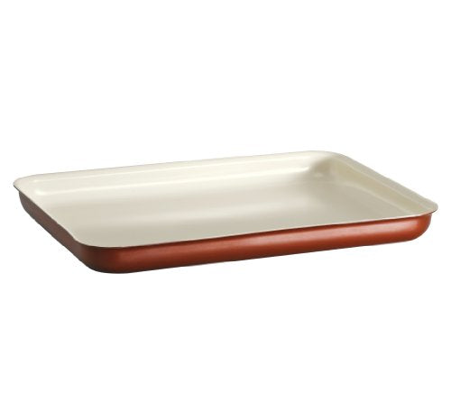 A rectangular baking dish with a beige interior and a copper-colored exterior, designed for oven use.