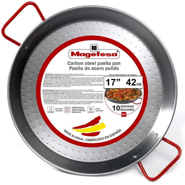 Close-up of the Magefesa 17" Carbon Steel Paella Pan with red handles and product label.