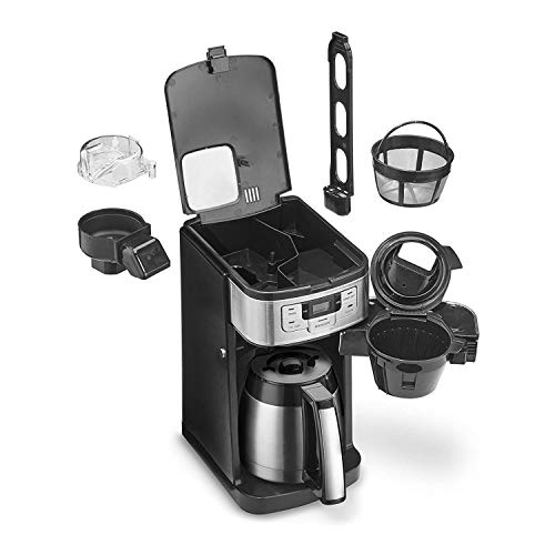 Cuisinart coffee maker shown with lid open, displaying removable grinder, filter basket, water filter, and included components.