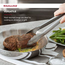 Stainless steel kitchen utility tongs with locking mechanism and scalloped edges