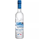 A 750ml frosted glass bottle of Grey Goose Vodka, featuring an elegant design with flying geese, blue accents, and French branding, representing its ultra-premium quality.