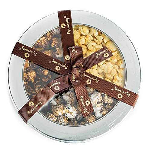 Top-down view of Popinsanity Gourmet Popcorn Trio Gift Tin, showcasing three gourmet popcorn flavors, beautifully arranged and tied with a ribbon for a luxurious presentation.