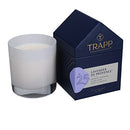 Trapp No. 25 Lavender de Provence 7 oz House Box Candle in a frosted white glass container, displayed next to its signature navy house-shaped packaging.