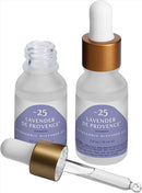  Two glass bottles of Trapp No. 25 Lavender de Provence ultrasonic diffuser oil, featuring a gold dropper cap and a soft lavender label.