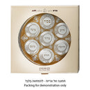 A sophisticated 40 cm glass Passover Seder plate featuring elegant gold accents and six labeled sections for the traditional Seder foods. The round glass design offers a modern yet timeless look for your Pesach table.