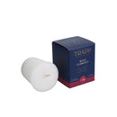 Trapp No. 24 Wild Currant 2 oz. Votive Candle in a wax form, displayed next to its navy and red packaging.