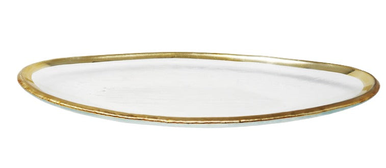 A sleek, oval-shaped glass platter with a slightly irregular form, featuring a transparent surface and a hand-applied gold rim. The elegant design makes it ideal for serving appetizers, desserts, or decorative display.